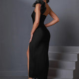 Side view of the asymmetrical formal dress showing the floral tulle shoulder detail.